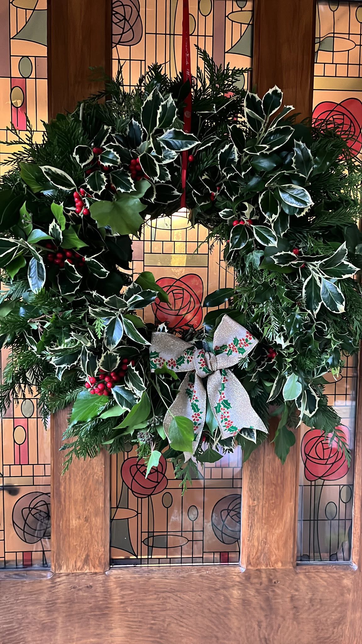 Festive Christmas wreath-making workshop with fresh foliage and natural decorations